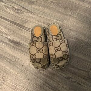 Gucci slides for sale $500 in good condition worn 2-3 times ! Size 7 and no box